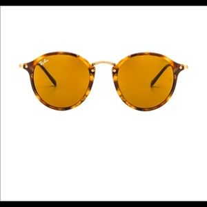 Rayban Round Fleck Sunglasses with brown lenses and tortoise frame.